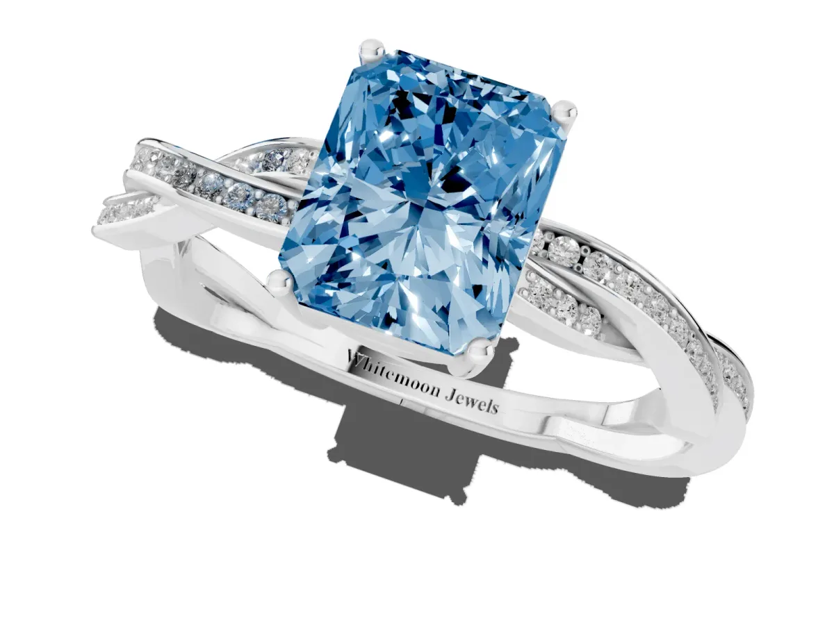 Fancy Blue Radiant Cut Solitaire Twisted Pave Diamond Ring with Four-Prong Setting Silver