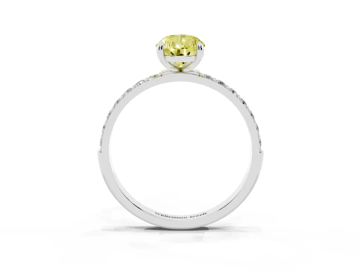 Fancy Yellow Pear Cut Diamond Solitaire Ring with Round Pavé Band and Prong Setting Silver