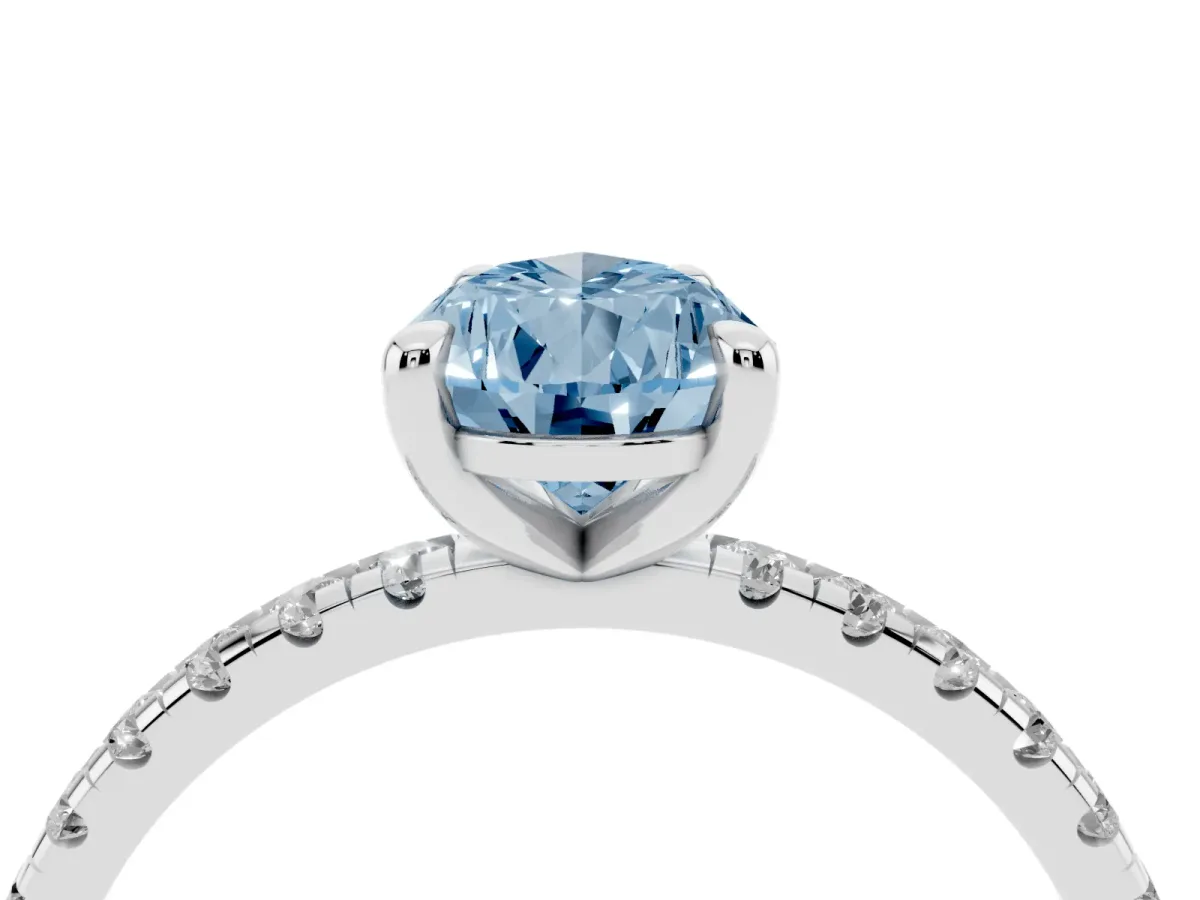 Fancy Blue Pear Cut Diamond Brilliant Solitaire Ring with Pavé Band and Four-Prong Setting Silver