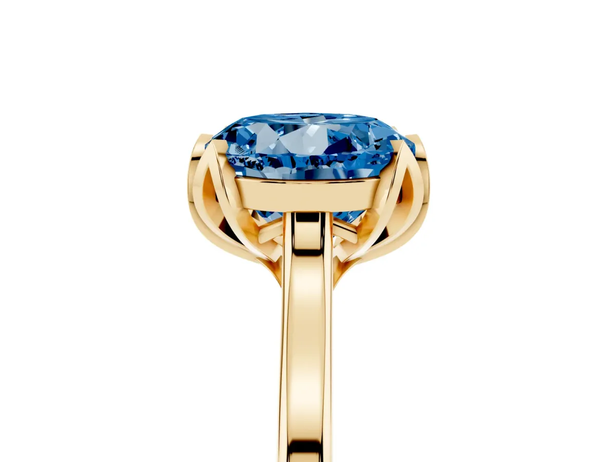 Fancy Blue Round Cut Diamond Solitaire Ring with Flower Prong Setting and Classic Band Yellow gold