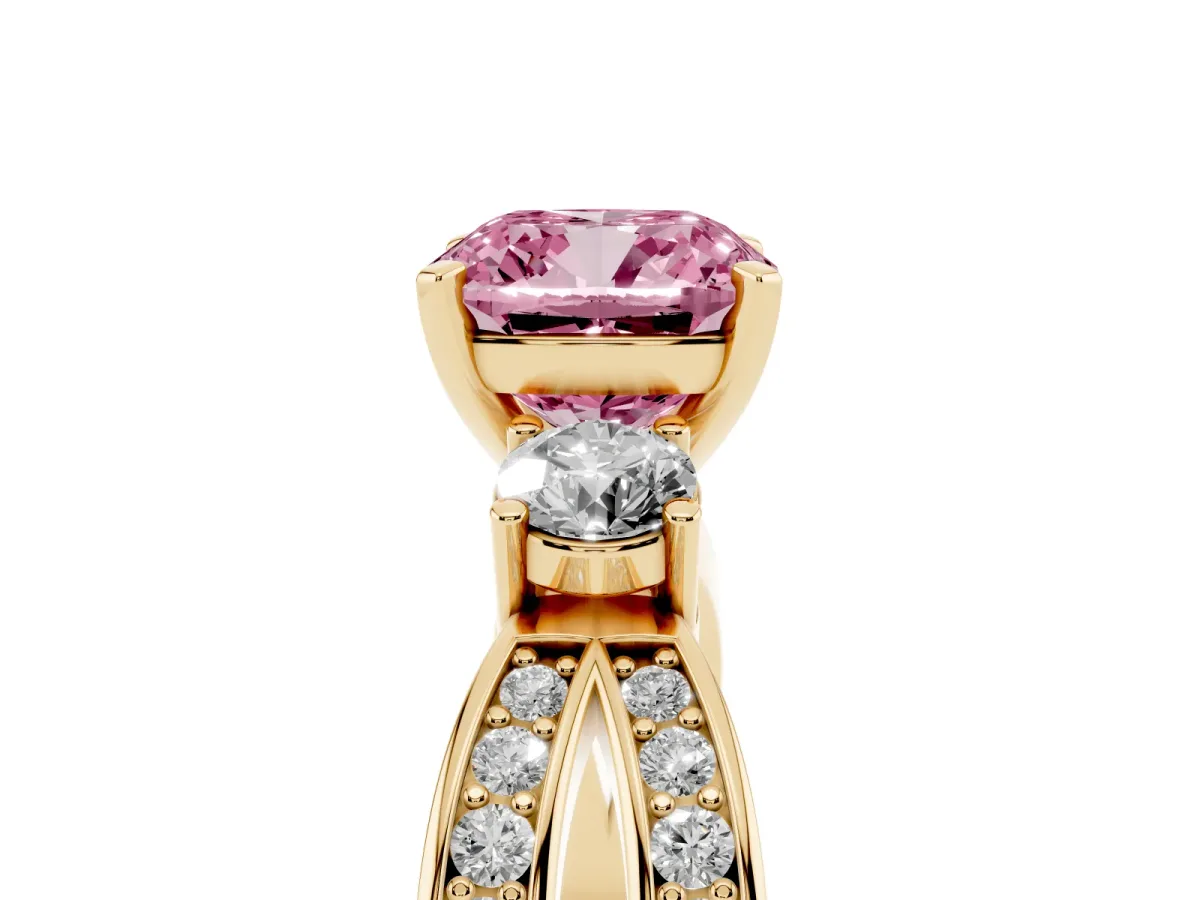Fancy Pink Three-Stone Cushion Cut Cut Diamond Twist Band with Prong Setting Yellow gold