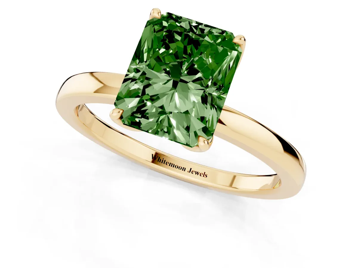 Fancy Green Radiant Cut Diamond Solitaire Ring with Thin Band and Prong Setting Yellow gold