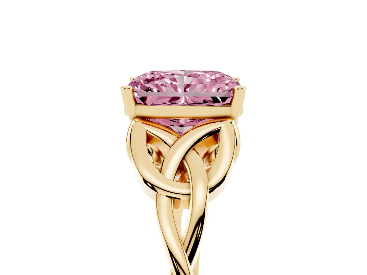 Fancy Pink Radiant Cut Diamond Solitaire Engagement Ring with Celtic Knot Band and Four-Prong Setting Yellow gold