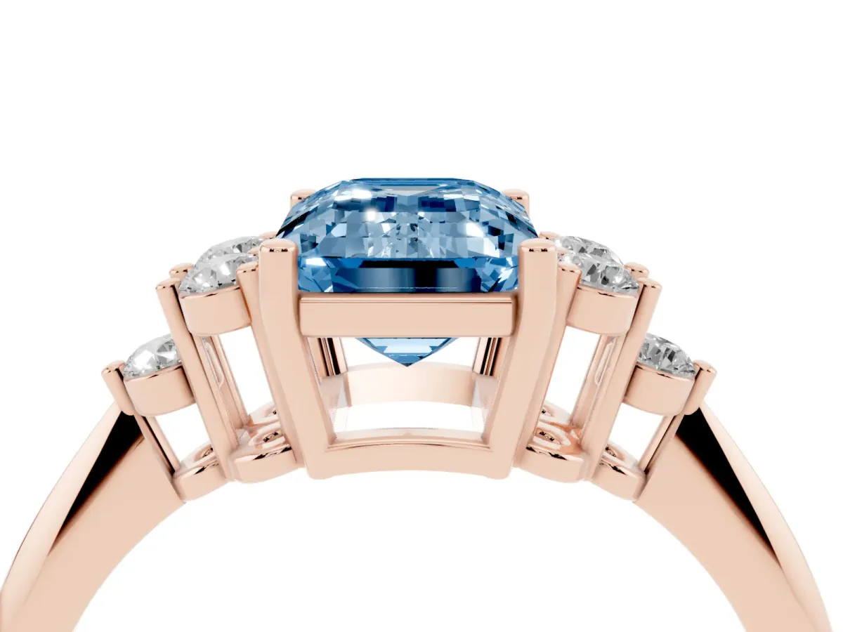 Fancy Blue Emerald Cut Cut Diamond Cluster Ring with Solitaire Band and Four-Prong Setting Rose gold