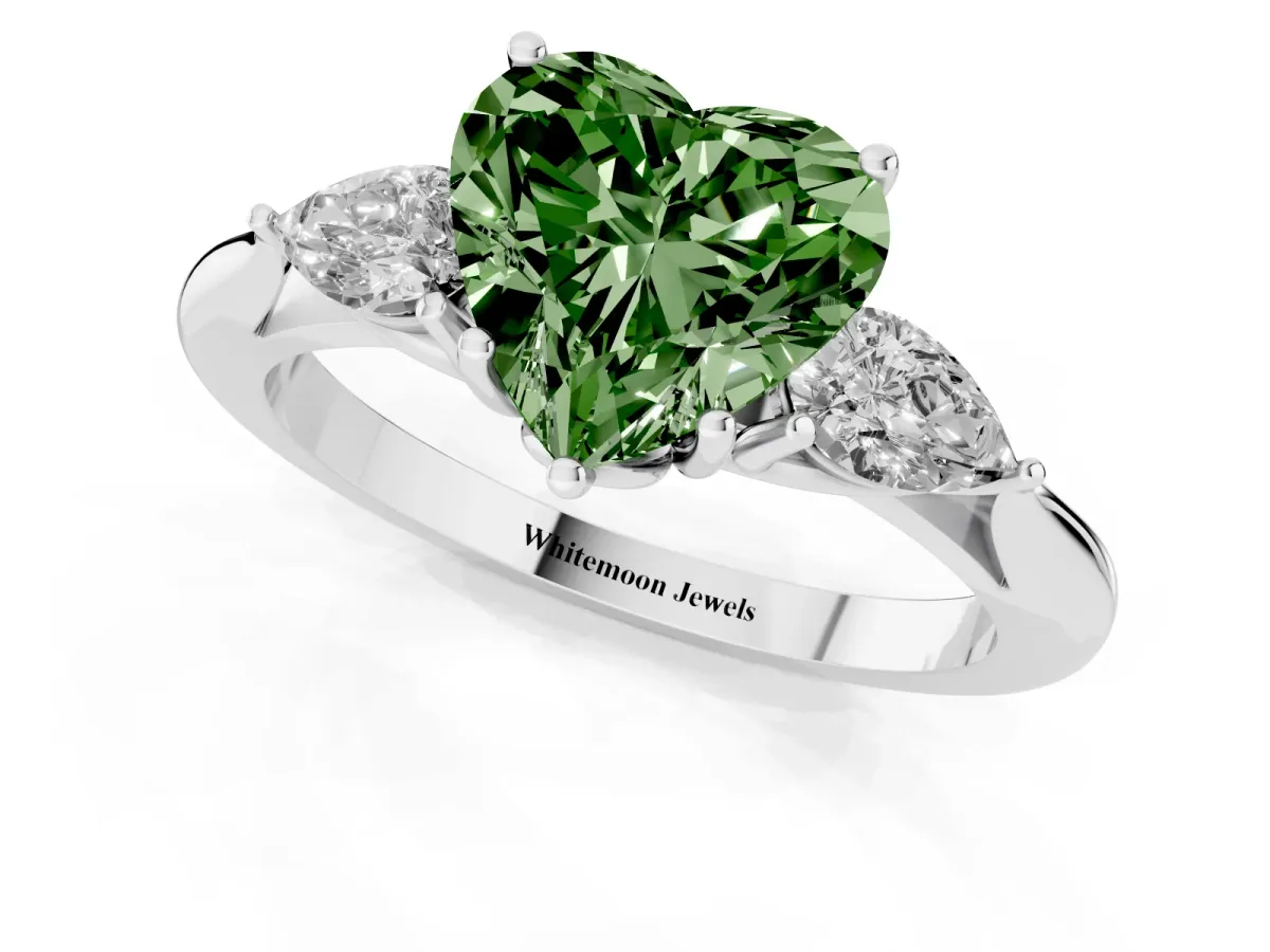 Fancy Green Three-Stone Heart Cut Diamond Ring with Pear Side Stones in Four-Prong Setting Platinum