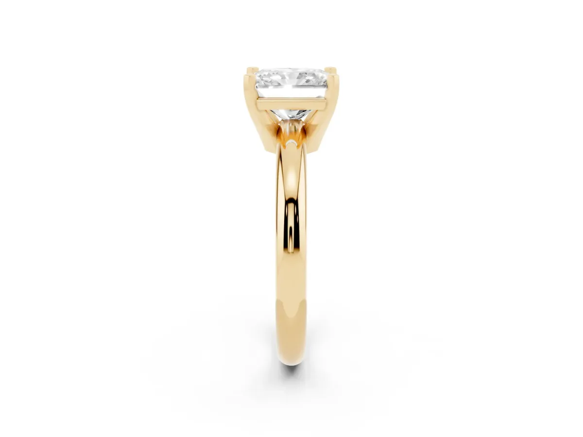 Radiant Cut Diamond Solitaire Engagement Ring with Round Band and Four-Prong Setting Yellow gold