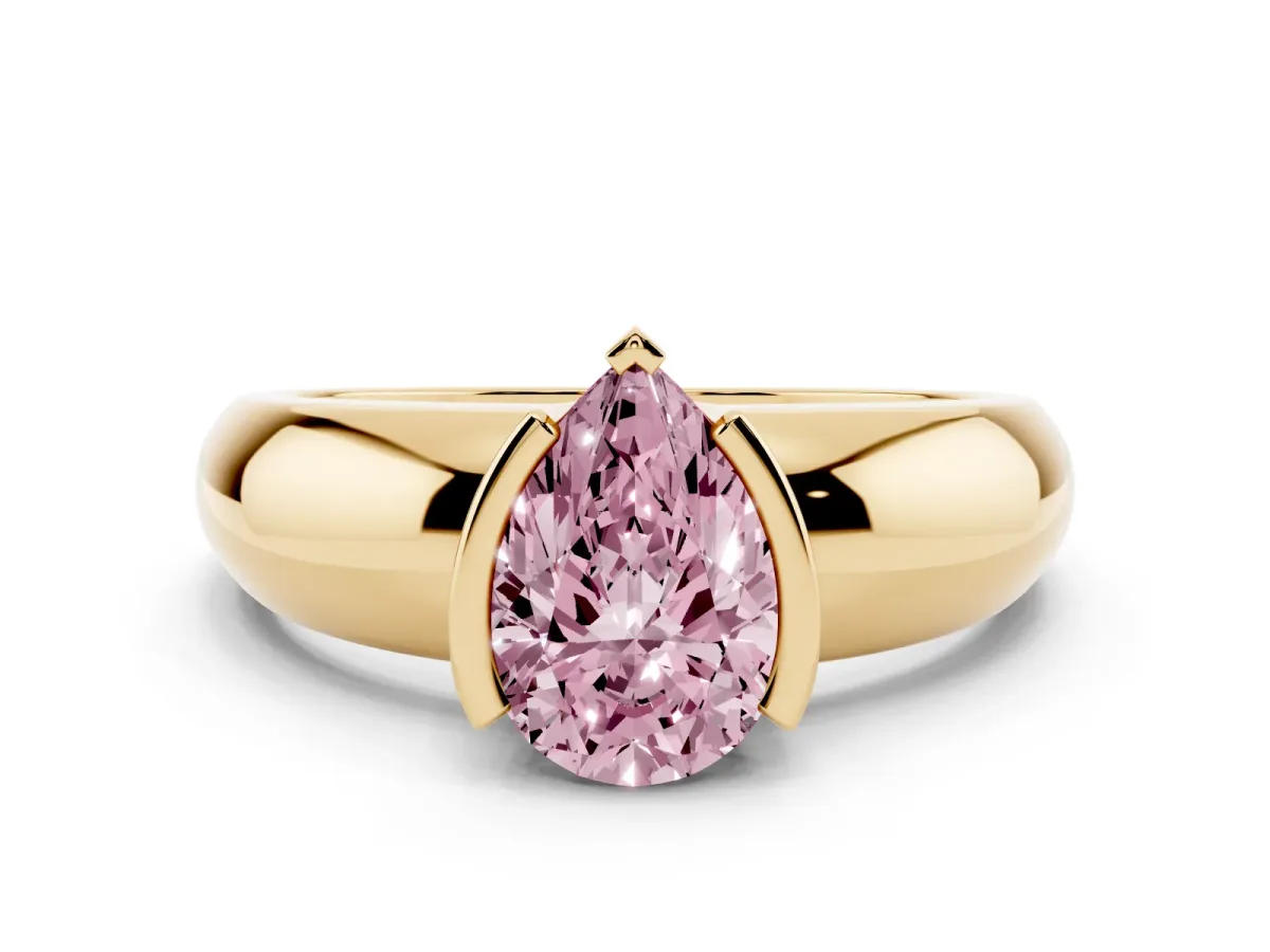 Fancy Pink Pear Cut Solitaire Tension Set Diamond Ring with Wide Band Yellow gold
