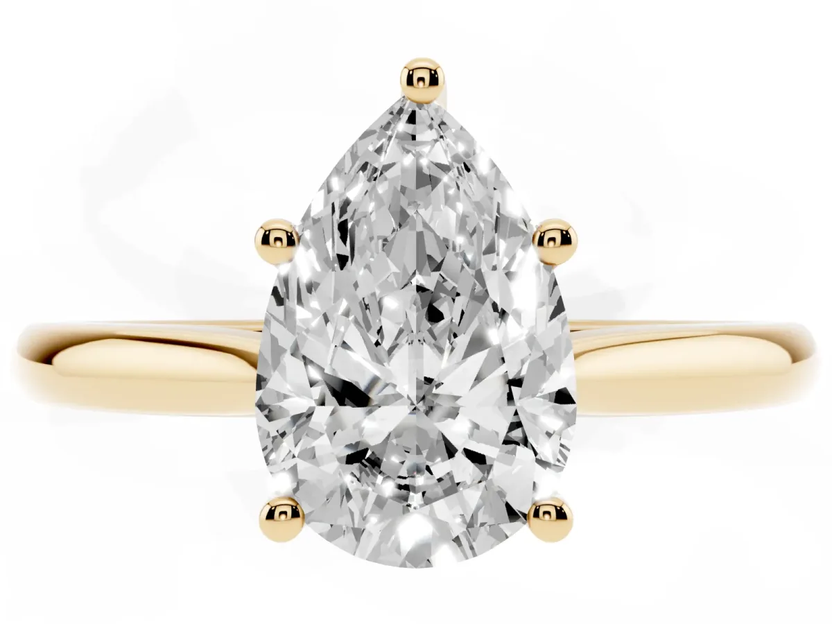 Pear Cut Cut Solitaire Ring with Cathedral Band and Four-Prong Setting Yellow gold