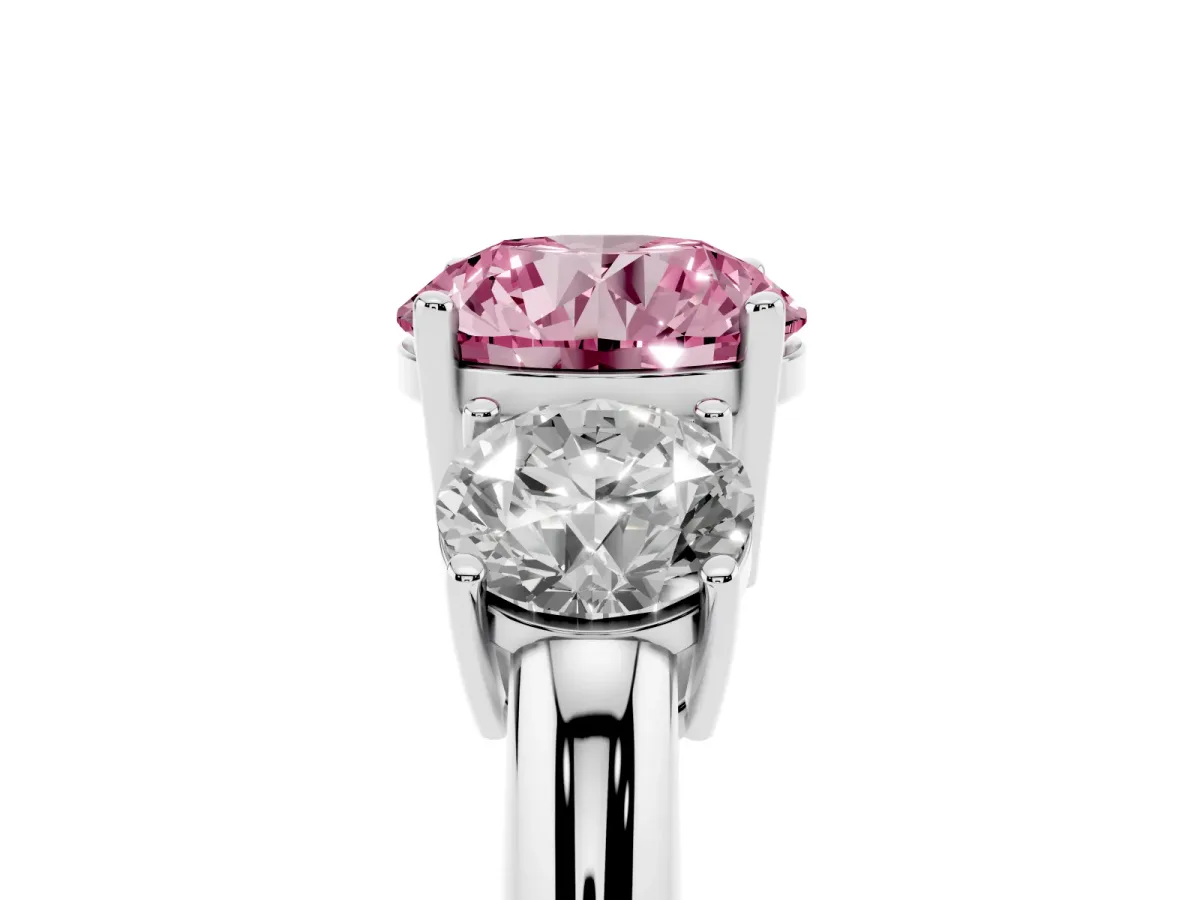 Fancy Pink Three-Stone Round Cut Cut Diamond Engagement Ring with Prong Setting on a White Gold Band Silver