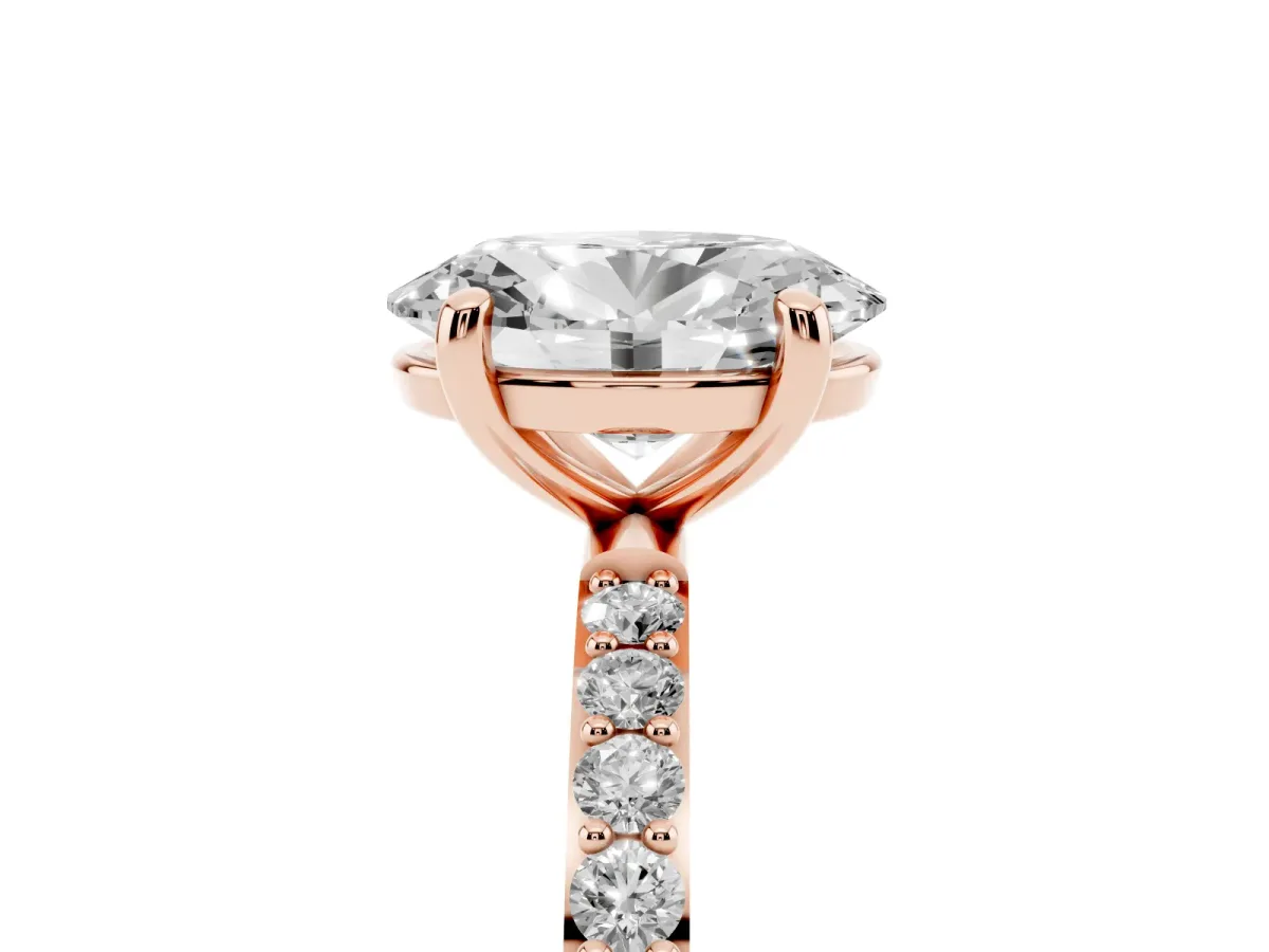 Oval Cut Diamond Solitaire Ring with Round Pavé Band and Prong Setting Rose gold