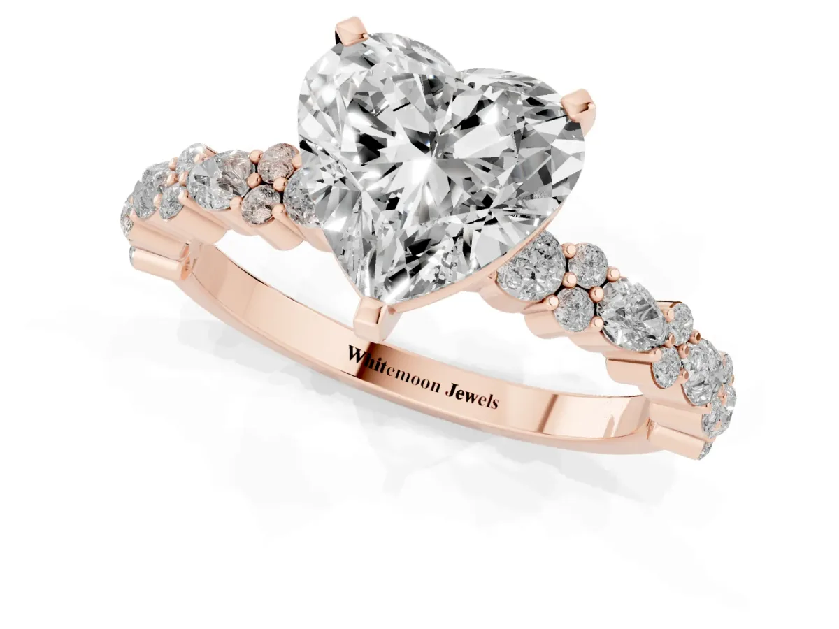 Heart Cut Diamond Side Stone Solitaire Ring with Round and Four-Prong Setting Rose gold