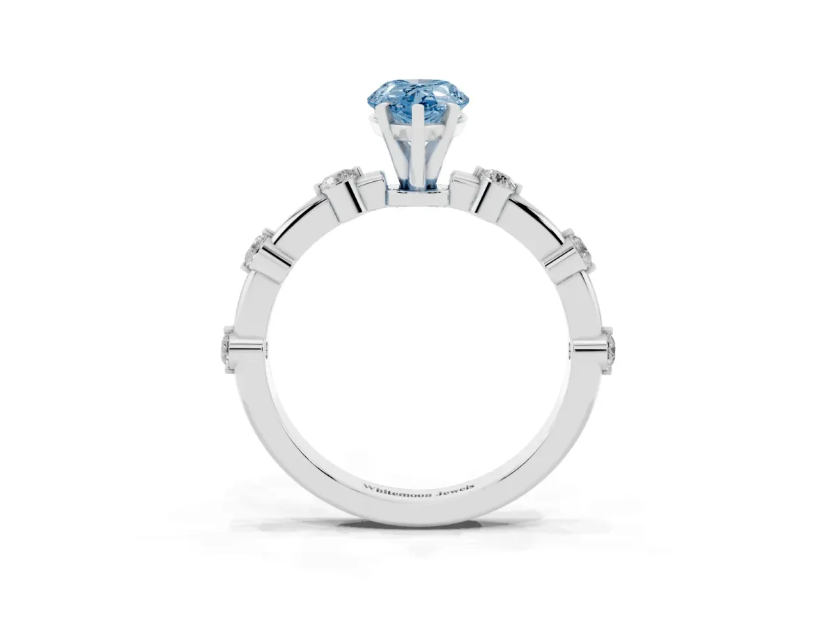 Fancy Blue Pear Cut Solitaire Diamond Ring with Bezel Set Side Stones and Prong Setting Platinum