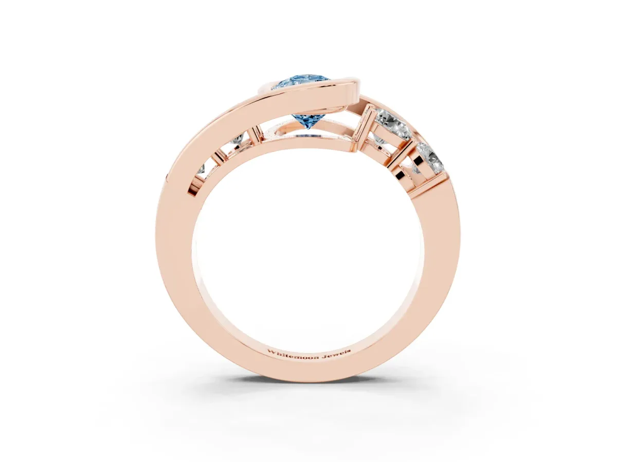 Fancy Blue Bezel Set Pear Cut Diamond Bypass Ring with Round Accents Rose gold