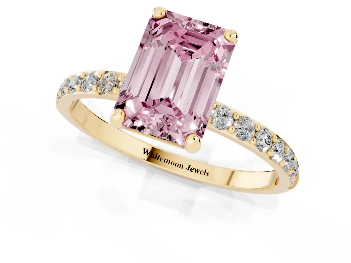 Fancy Pink Emerald Cut Diamond Solitaire Ring with Round Pavé Band and Prong Setting Yellow gold