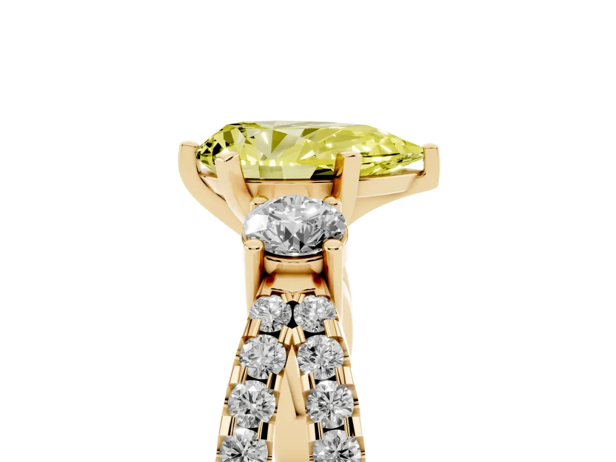 Fancy Yellow Pear Cut Diamond Three-Stone Ring with Pavé Split Shank and Four-Prong Setting Yellow gold