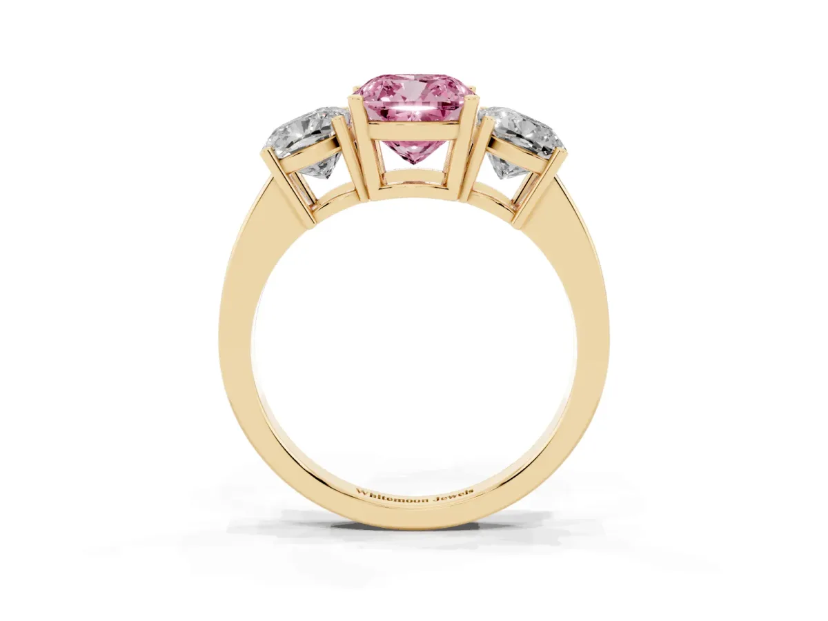 Fancy Pink Three-Stone Cushion Cut Cut Diamond Engagement Ring with Flat Band and Four-Prong Setting Yellow gold