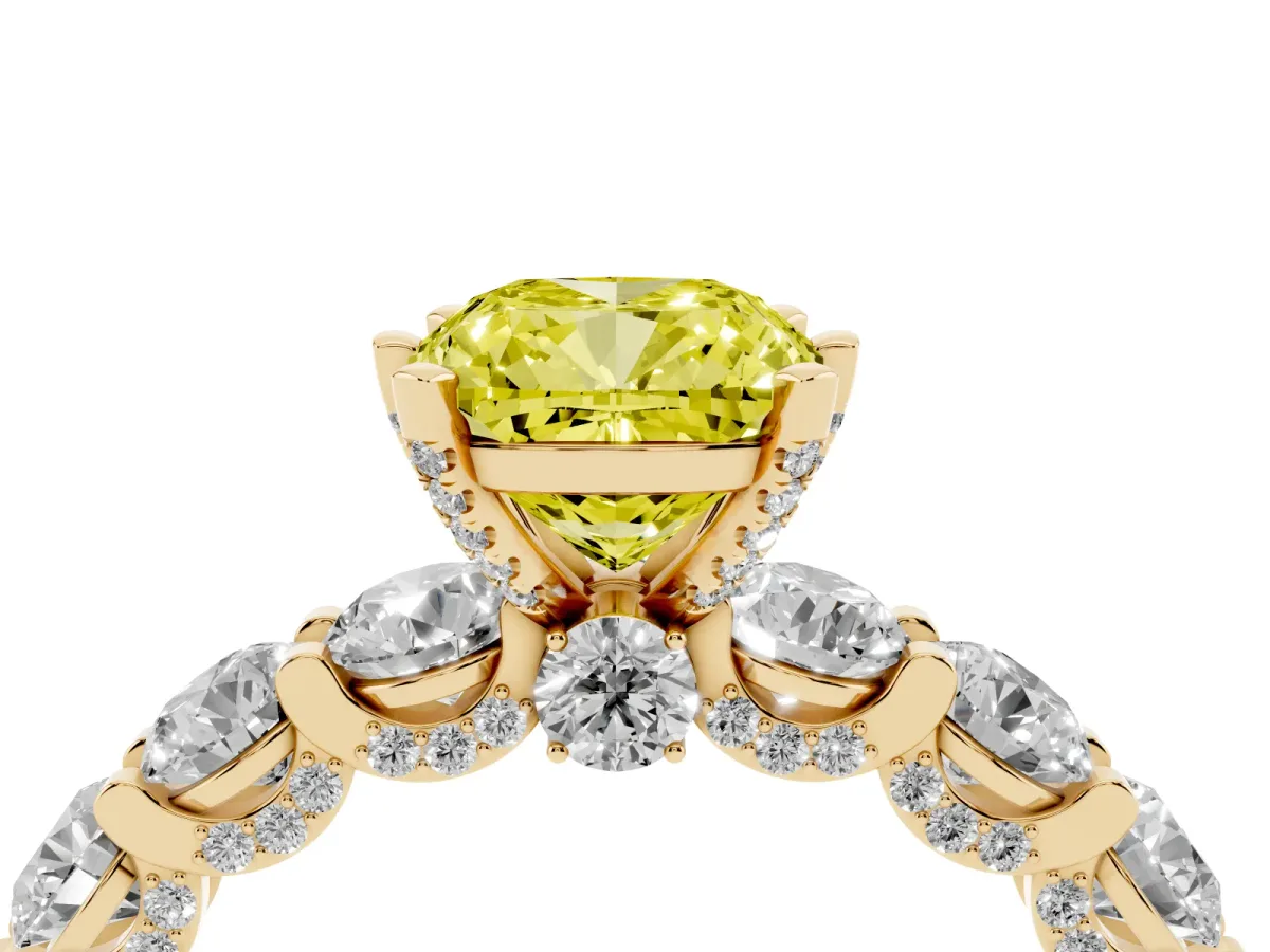 Fancy Yellow Cushion Cut Diamond Side Stone Engagement Ring with Four-Prong Setting Yellow gold
