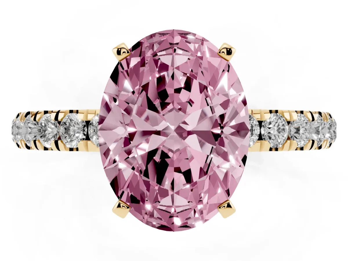 Fancy Pink Oval Cut Diamond Solitaire Ring with Pavé Accents and Four-Prong Setting Yellow gold