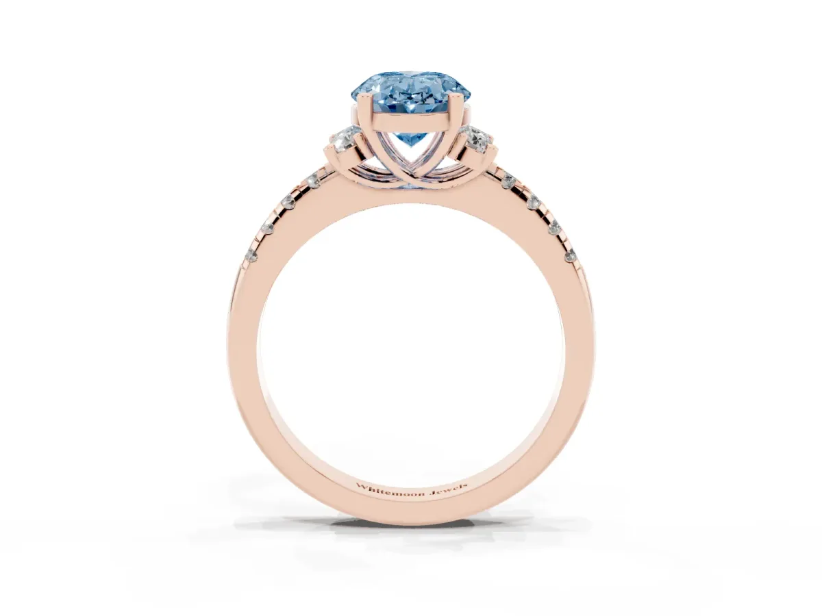 Fancy Blue Oval Cut Diamond Three-Stone Pave Band with Four-Prong Setting Rose gold