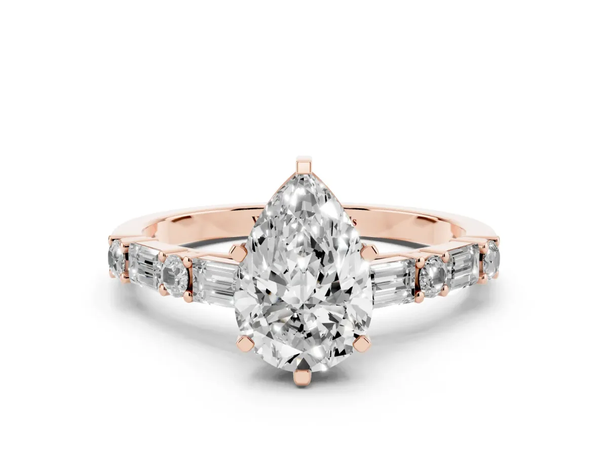 Pear Cut Diamond Solitaire with Side Baguettes and Channel Set Band Rose gold