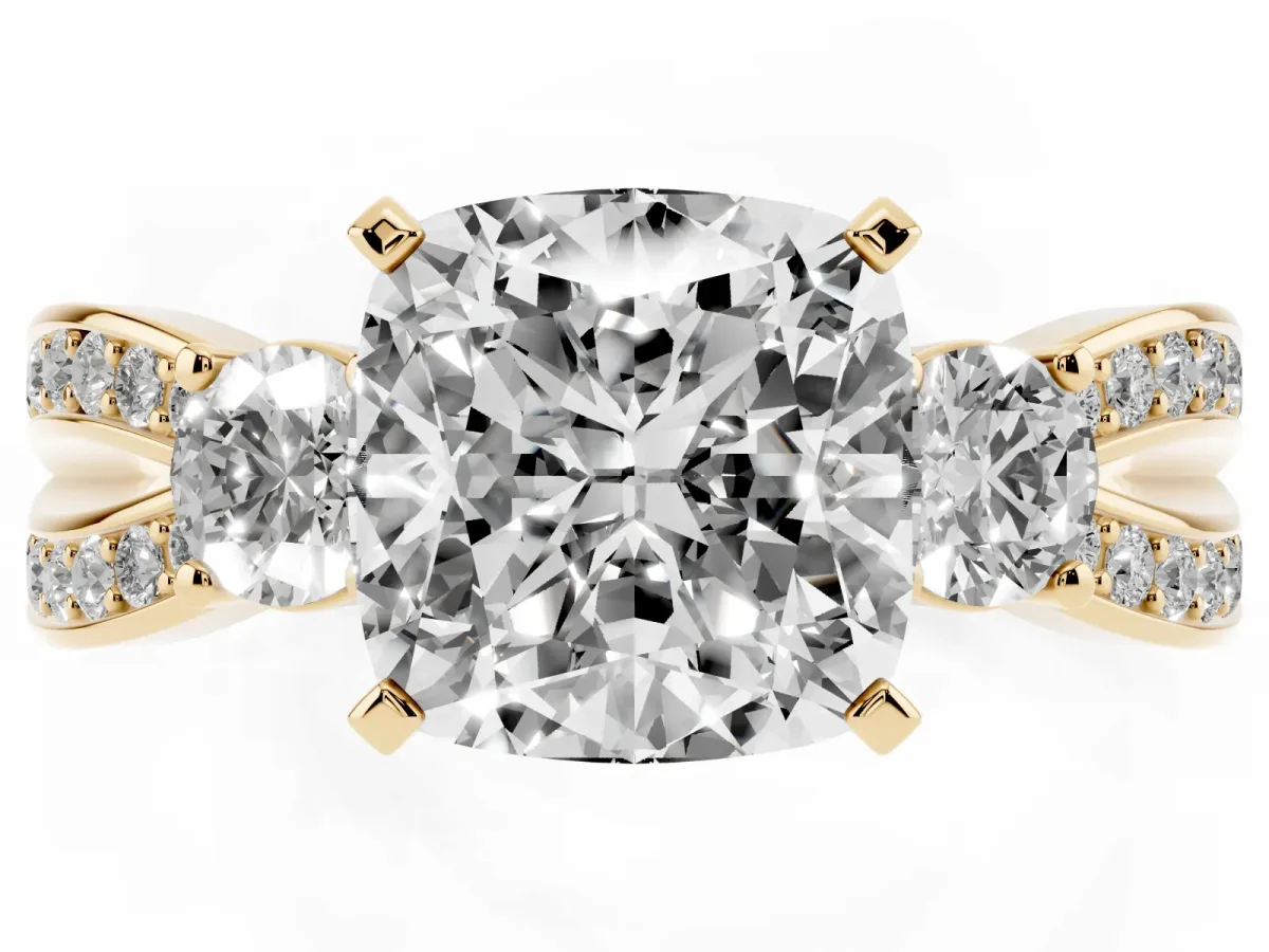Three-Stone Cushion Cut Cut Diamond Twist Band with Prong Setting Yellow gold