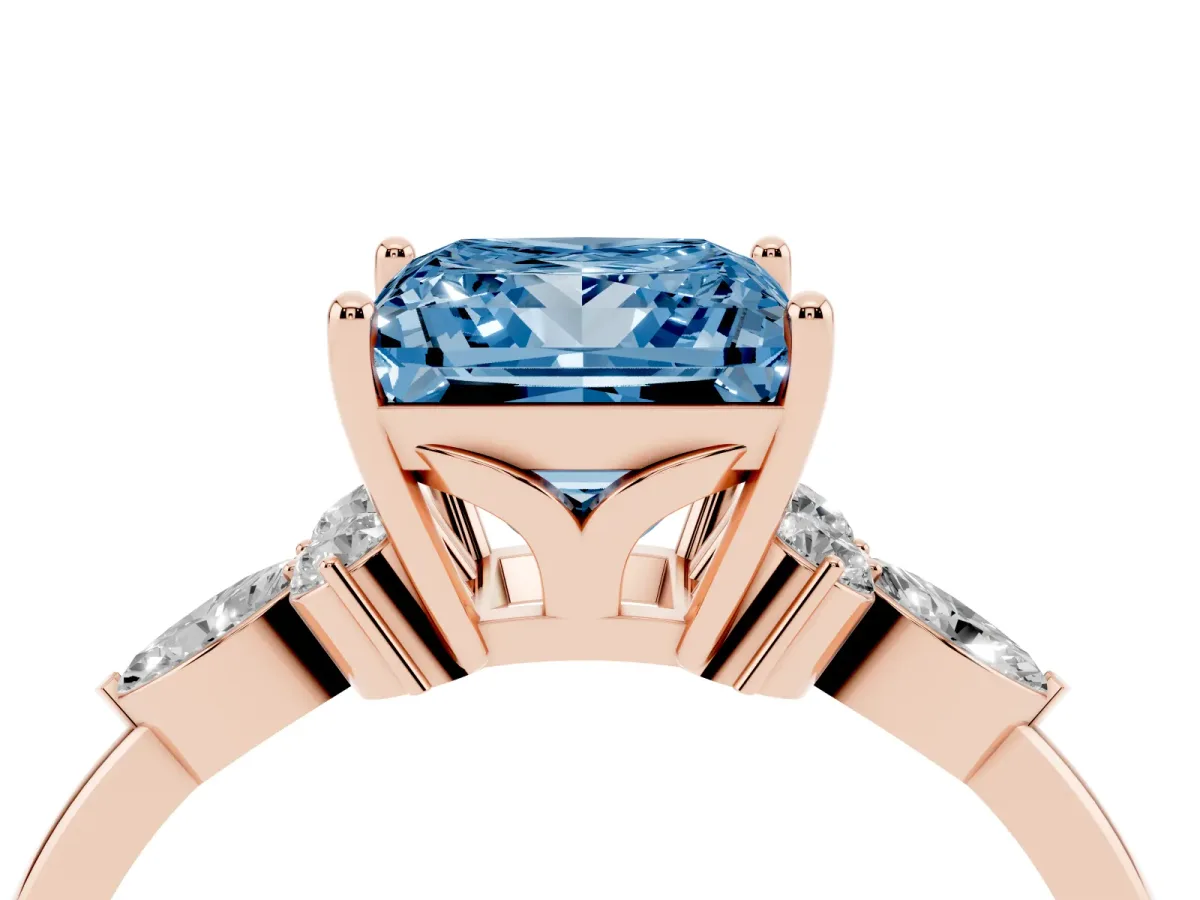 Fancy Blue Princess Cut Brilliant Diamond Solitaire Ring with Pear Side Stones and Four-Prong Setting Rose gold