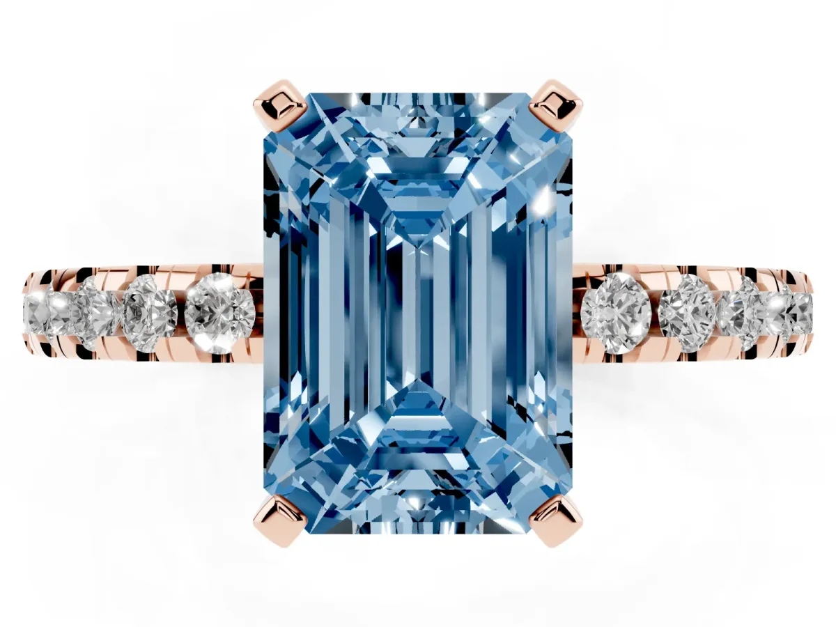 Fancy Blue Emerald Cut Diamond Solitaire Ring with Round Pavé Band and Four-Prong Setting Rose gold