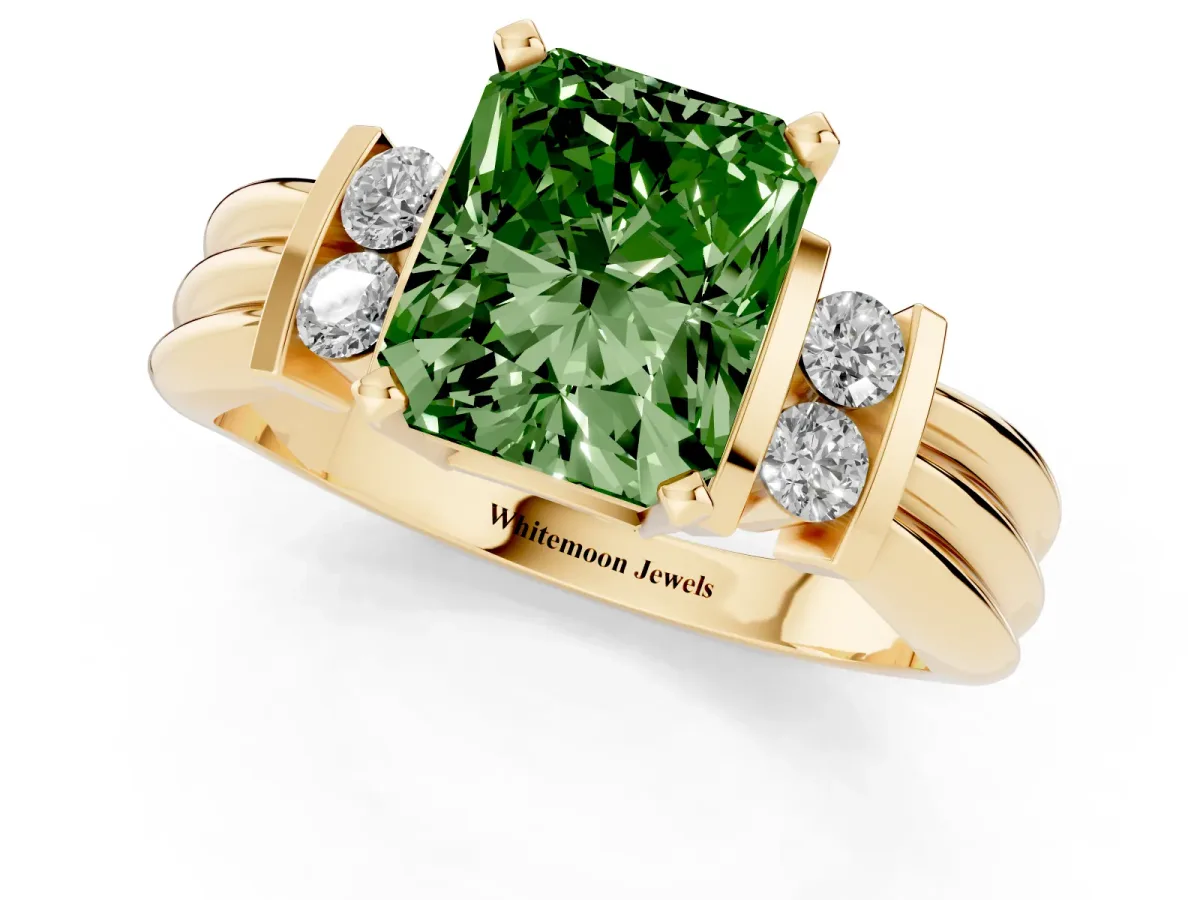 Fancy Green Radiant Cut Cut Three-Stone Channel Set Ring with Bar Prongs Yellow gold