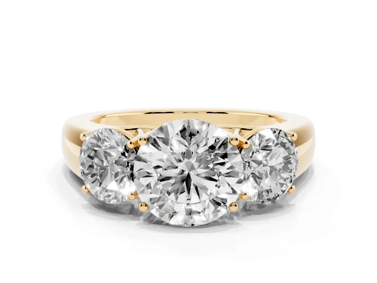 Three-Stone Round Cut Cut Diamond Ring with Prong Setting and Classic Band Yellow gold