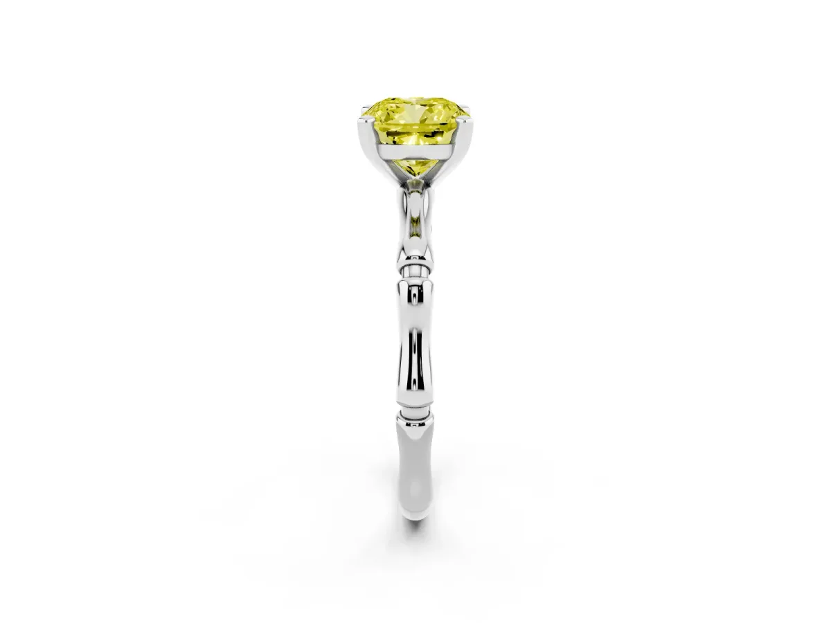 Fancy Yellow Cushion Cut Solitaire Diamond Ring with Bamboo Band and Four-Prong Setting Platinum