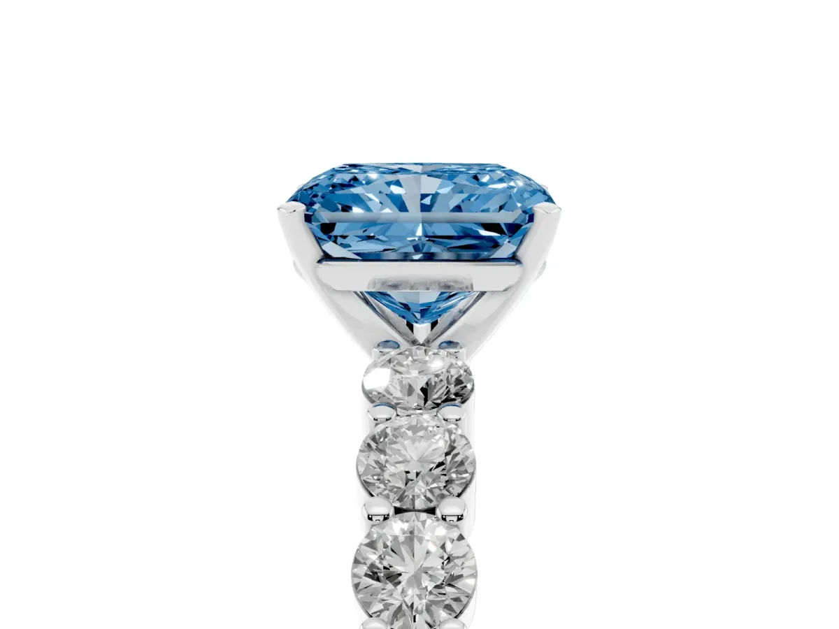 Fancy Blue Radiant Cut Diamond Solitaire Ring with Shared Prong Round Side Stones Platinum