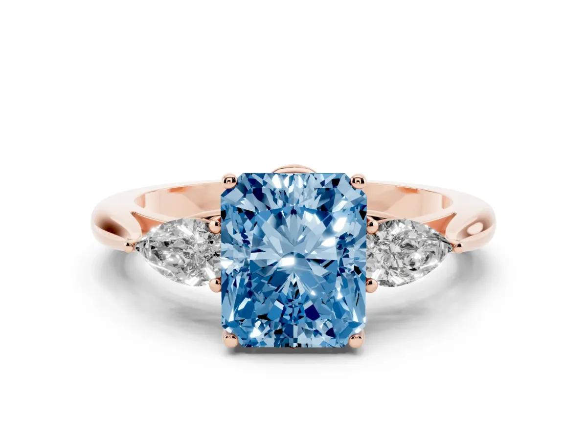 Fancy Blue Radiant Cut Diamond Three-Stone Ring with Pear Side Stones and Prong Setting Rose gold