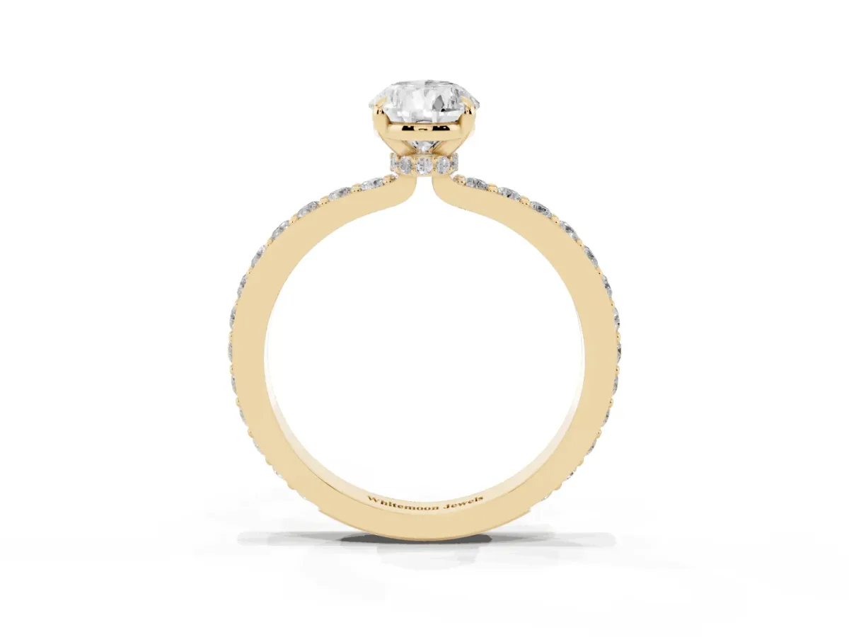 Pear Cut Diamond Pavé Engagement Ring with Round Accents and Prong Setting Yellow gold