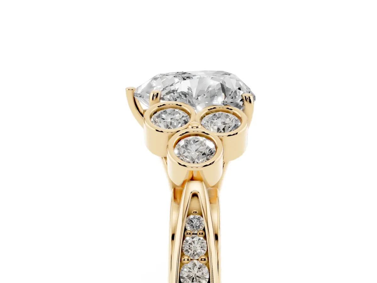 Heart Cut Cut Diamond Engagement Ring with Bezel Set Round Side Stones and Prong Setting Yellow gold
