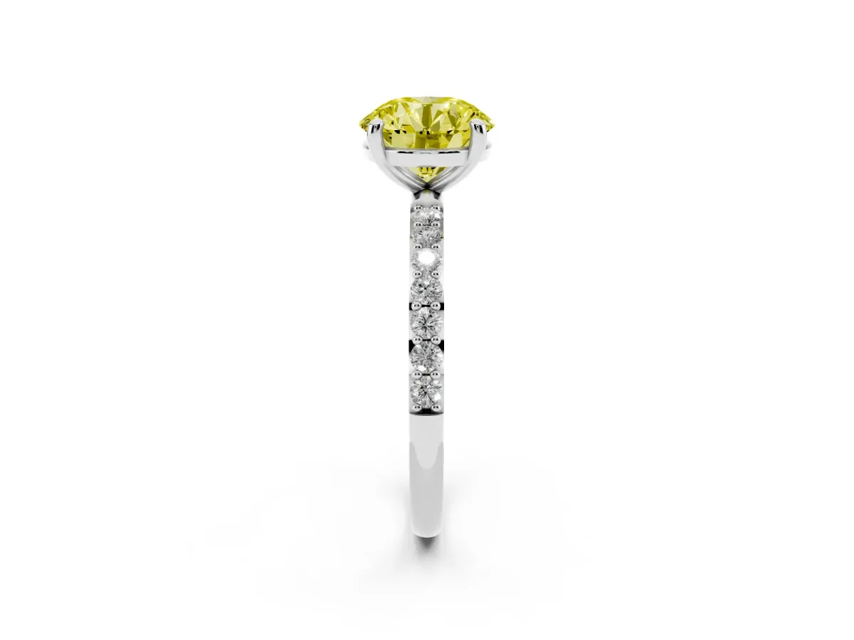 Fancy Yellow Round Cut Diamond Solitaire Ring with Round Pavé Band and Prong Setting Silver