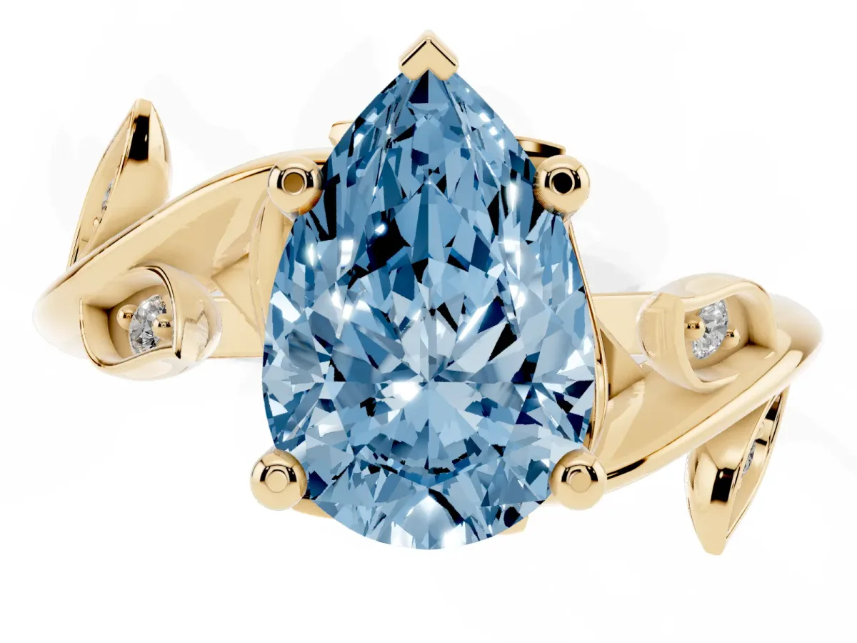Fancy Blue Pear Cut Solitaire Twist Engagement Ring with Leaf Accents and Prong Setting Yellow gold