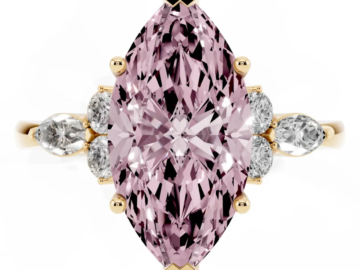 Fancy Pink Marquise Cut Brilliant Diamond Solitaire Ring with Pear Side Stones and Four-Prong Setting Yellow gold