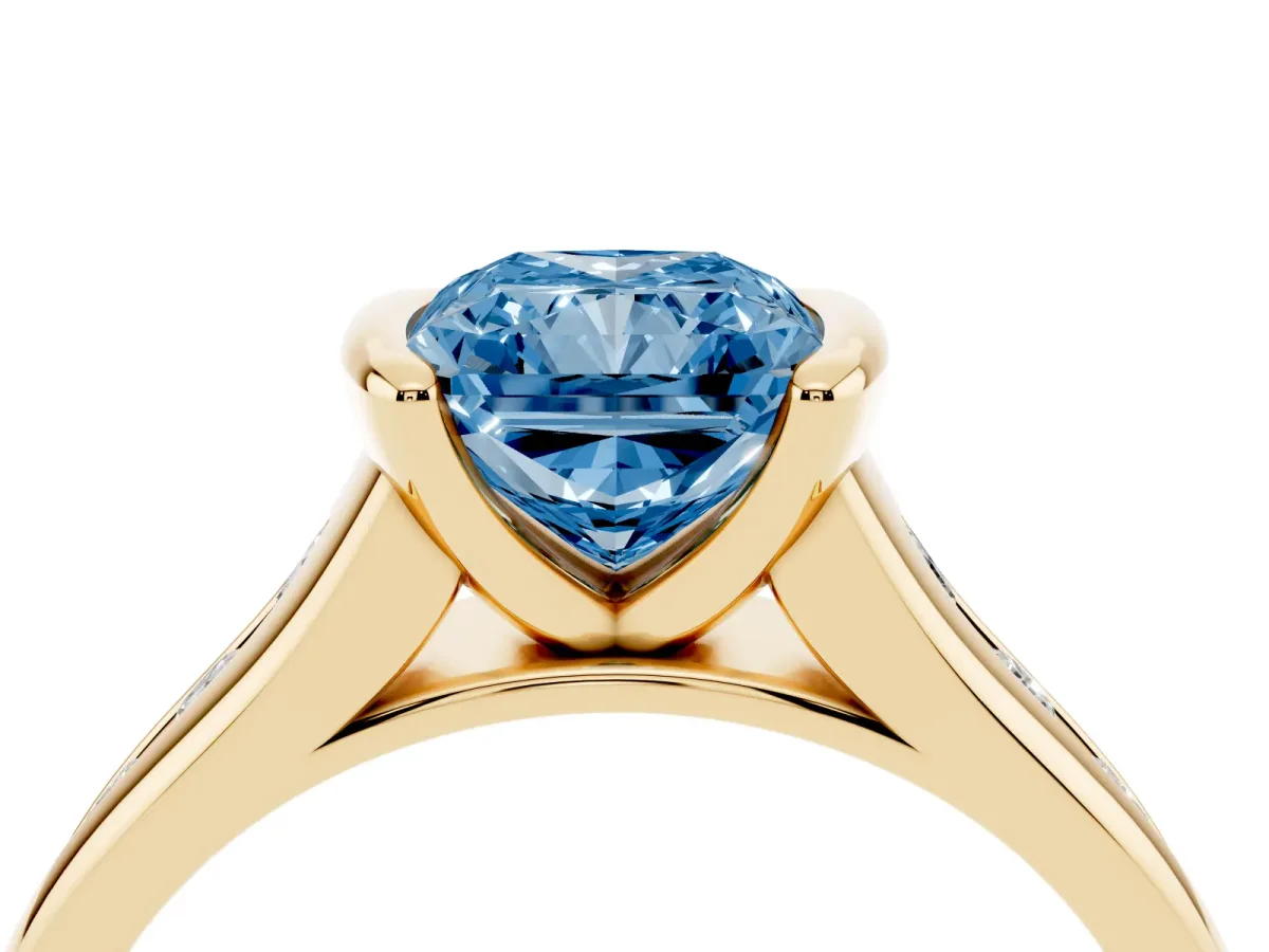 Fancy Blue Radiant Cut Solitaire Bezel-Set Diamond Ring with Channel-Set Band Yellow gold
