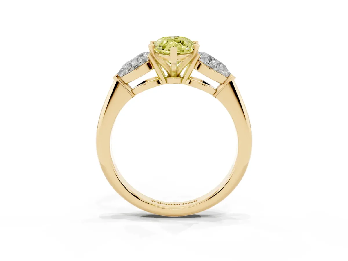 Fancy Yellow Three-Stone Marquise Cut Diamond Ring with Pear Side Stones and Four-Prong Setting Yellow gold