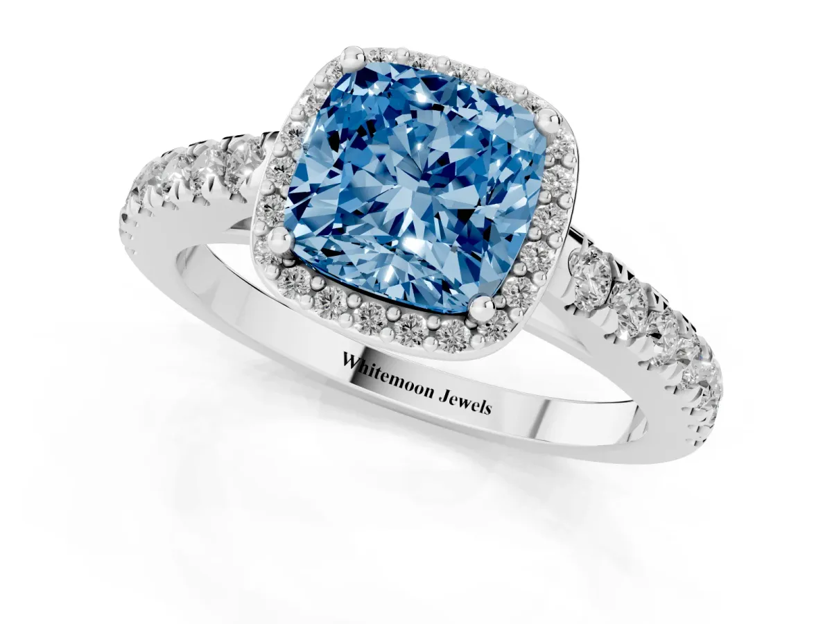 Fancy Blue Cushion Cut Cut Halo Diamond Engagement Ring with Pave Band and Four-Prong Setting Silver