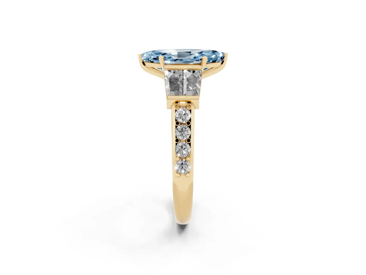 Fancy Blue Marquise Cut Diamond Engagement Ring with Baguette Side Stones and Channel Set Band Yellow gold