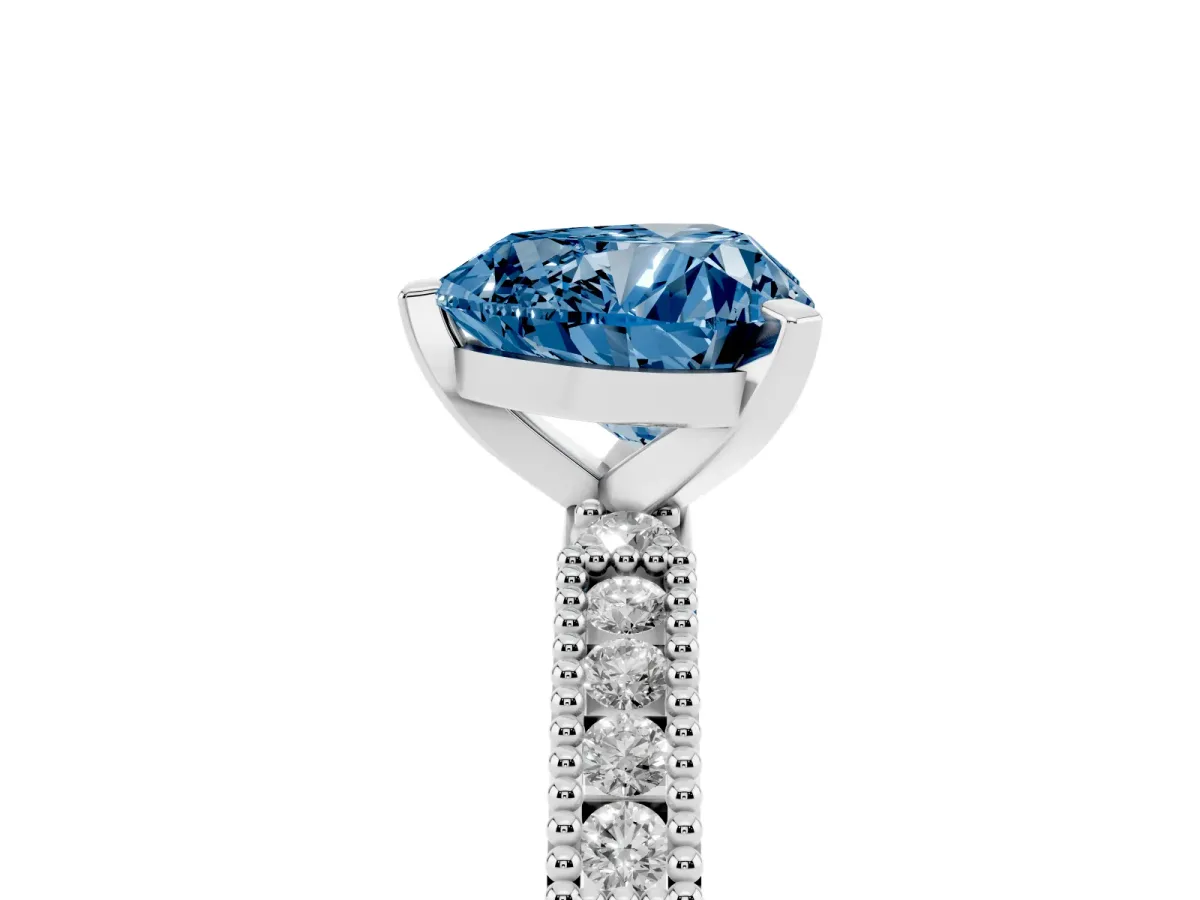 Fancy Blue Heart Cut Solitaire with Pavé Band and Four-Prong Setting Silver