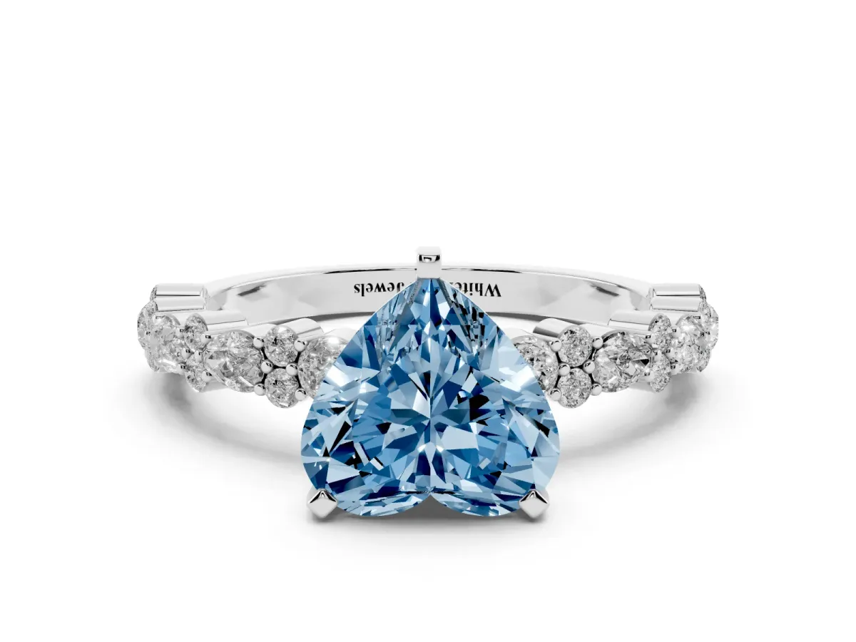 Fancy Blue Heart Cut Diamond Side Stone Solitaire Ring with Round and Four-Prong Setting Silver