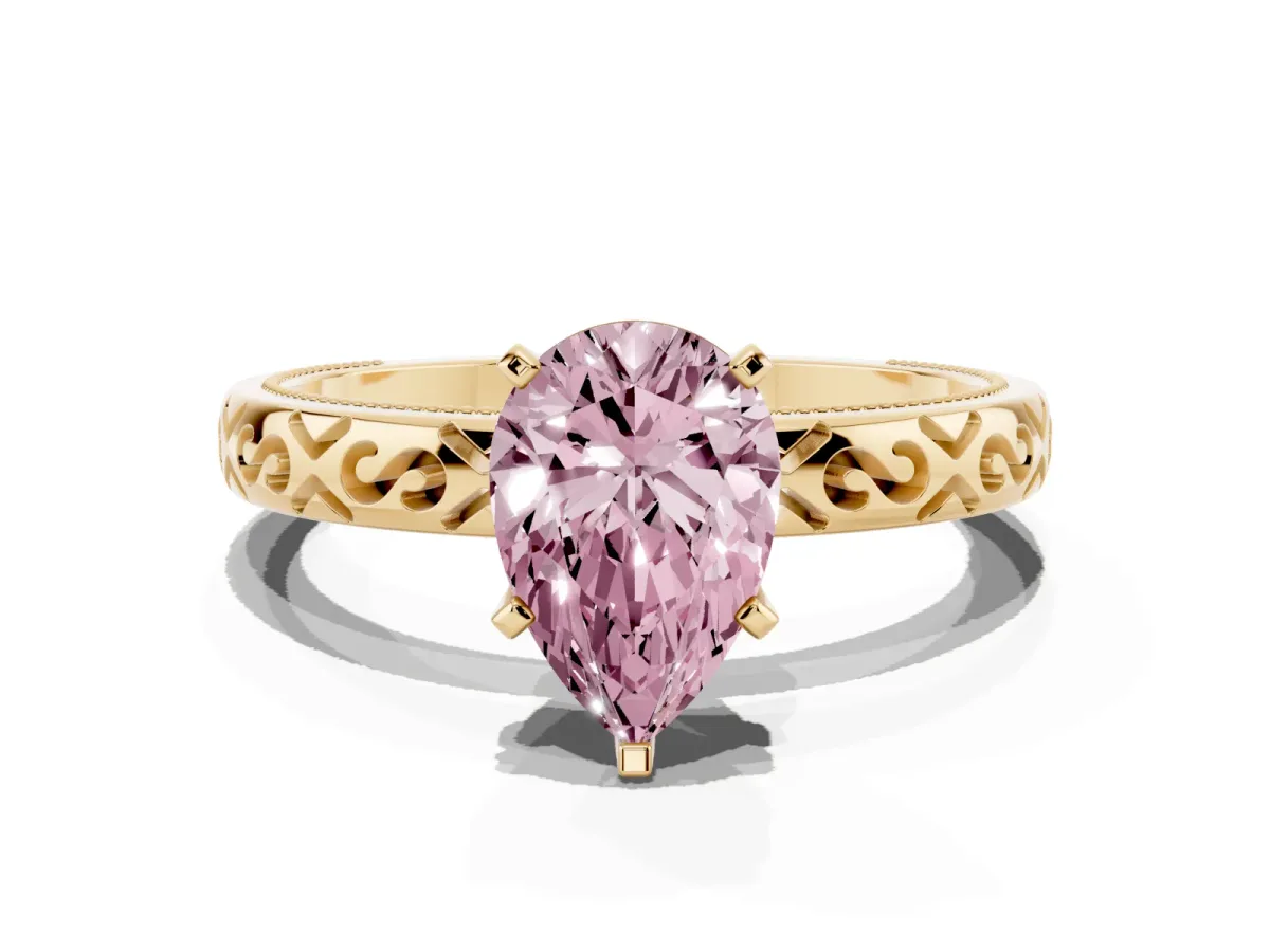Fancy Pink Pear Cut Solitaire Engagement Ring with Scrollwork Band and Four-Prong Setting Yellow gold