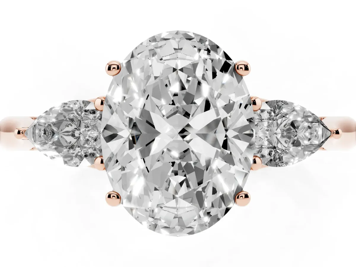 Three-Stone Oval Cut Brilliant Diamond Solitaire Ring with Tapered Band and Four-Prong Setting Rose gold