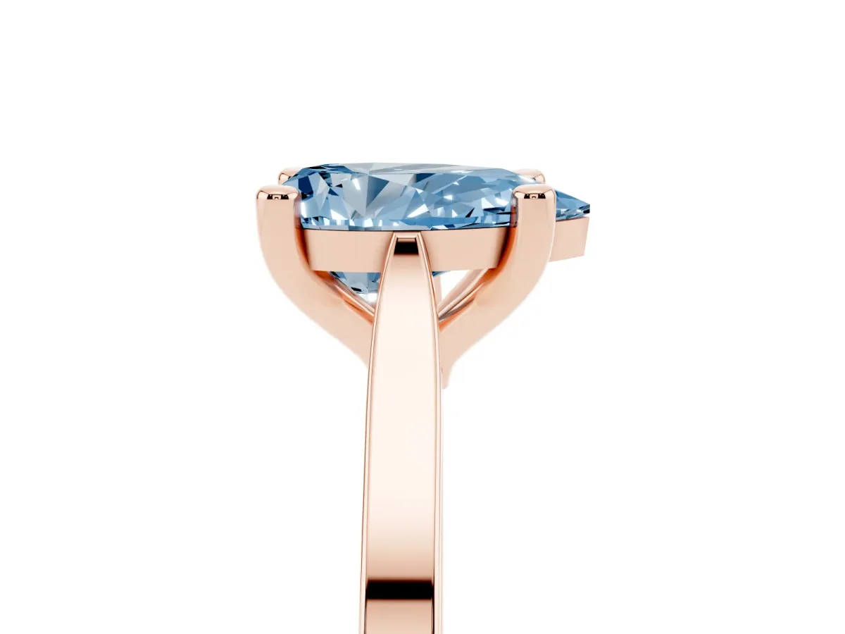 Fancy Blue Pear Cut Solitaire Diamond Ring with Four-Prong Setting and Tapered Band Rose gold