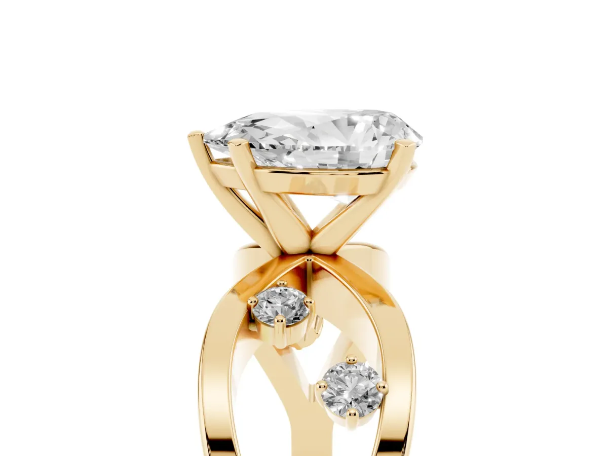 Pear Cut Cut Solitaire Diamond with Side Stones on Criss-Cross Band and Four-Prong Setting Yellow gold