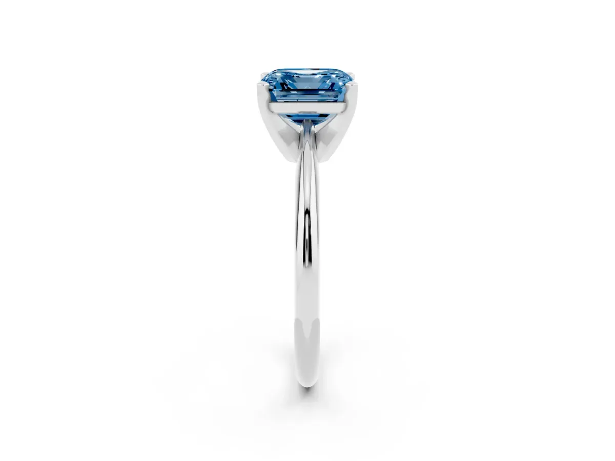 Fancy Blue Asscher Cut Cut Solitaire Ring with Four-Prong Setting on a Classic Band Platinum