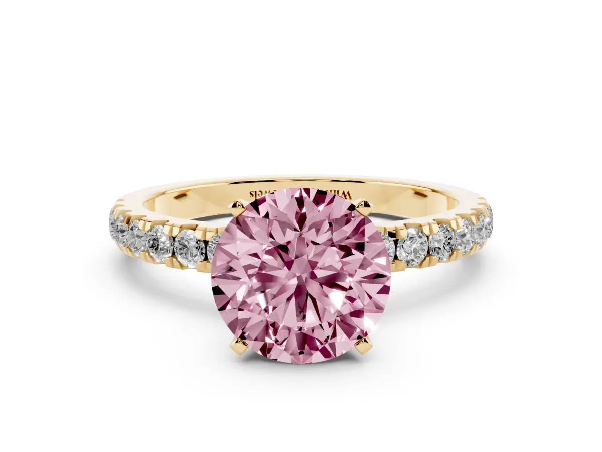 Fancy Pink Round Cut Diamond Solitaire Ring with Pavé Accents and Four-Prong Setting Yellow gold