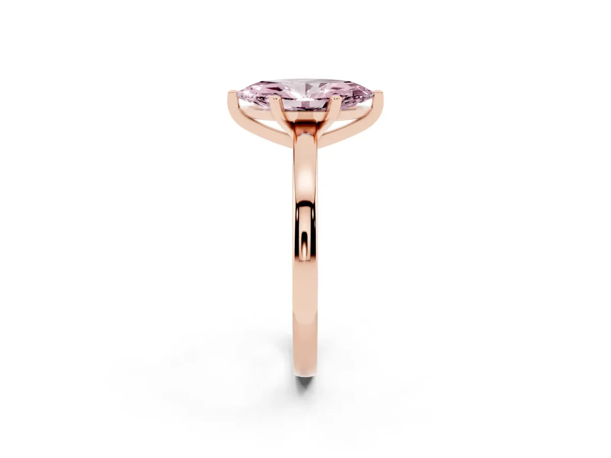Fancy Pink Marquise Cut Solitaire Diamond Engagement Ring with Four-Prong Setting on a Classic Band Rose gold